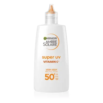 Garnier Ambre Solaire Super UV könnyű védőfolyadék a sötét foltok ellen C vitamin SPF 50+ 40 ml