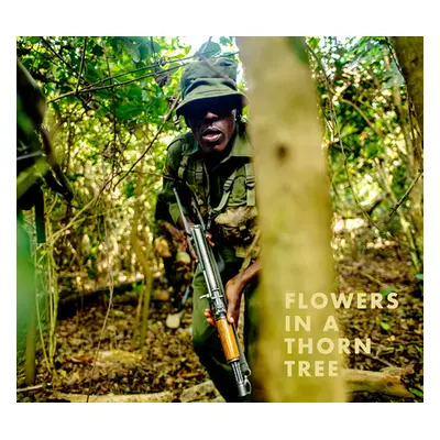 "Steven Thackston: Flowers in a Thorn Tree: On the Road with the Warriors for Peace and Wildlife