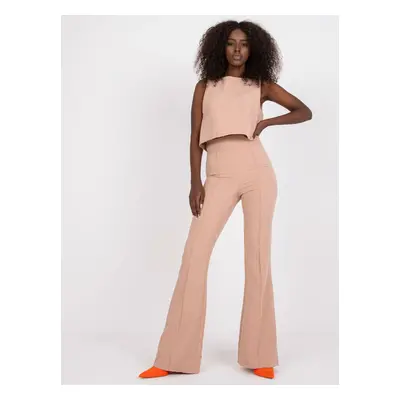 Dusty pink two-piece set with elegant trousers