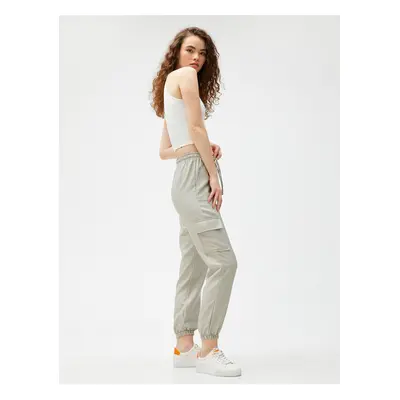 Koton Cargo Pants with a lace-up waist, pocket detail and elasticated legs.