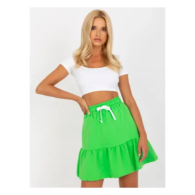 Light green short sweatshirt skirt with tie detail