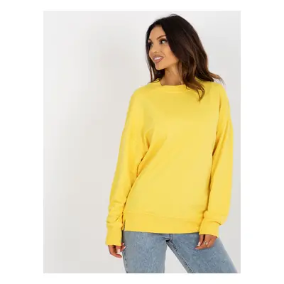 Yellow loose sweatshirt without hood with a round neckline