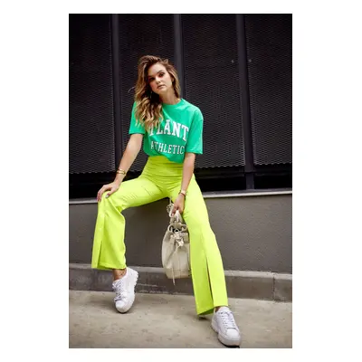 Lady's elegant trousers with slit neon lime