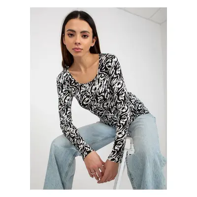 Black and white fitted blouse with patterns