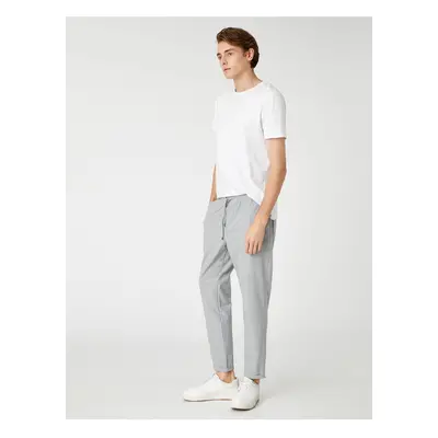 Koton Men's Clothing. Basic Woven Trousers with Tie Waist, Pocket Detailed