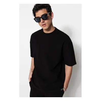 Trendyol Limited Edition Black Oversize 100% pamut címkével ellátott texturált alap vastag póló