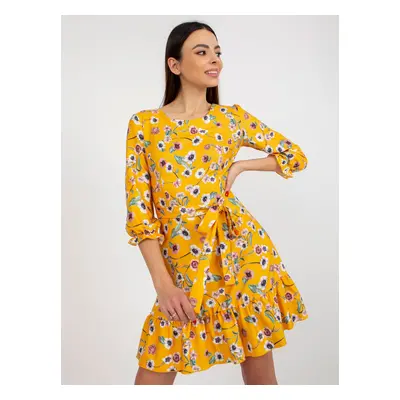 Dark yellow floral dress with tie and ruffle