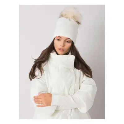 White winter hat with pompom