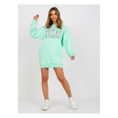 Light green oversized sweatshirt with print