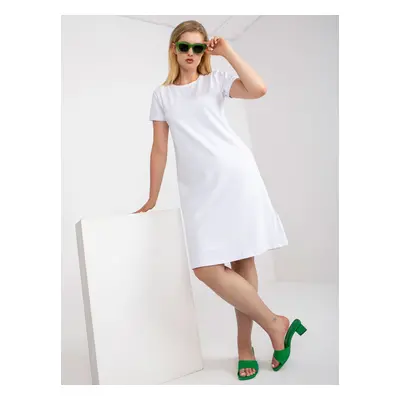 White cotton dress of larger size with ruffle at the back