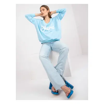 Light blue and white sweatshirt with print and V-neck