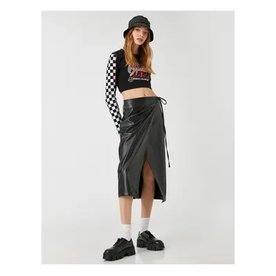 Koton Midi Skirt with Deep Slits and Wrapover Fastening with a Leather Look.