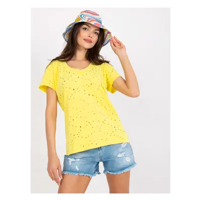 Yellow monochrome T-shirt with holes