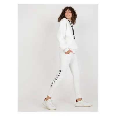 Ecru women's tracksuit with inscriptions and zippers