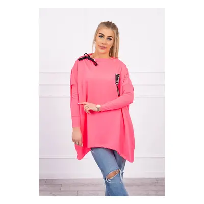 Oversize sweatshirt with asymmetrical sides in pink neon color