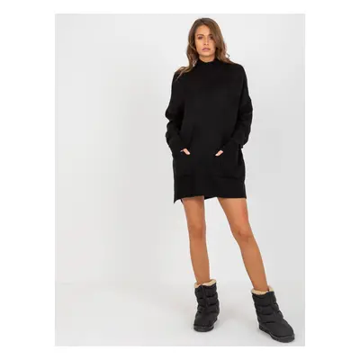 Lady's black oversized sweater with turtleneck