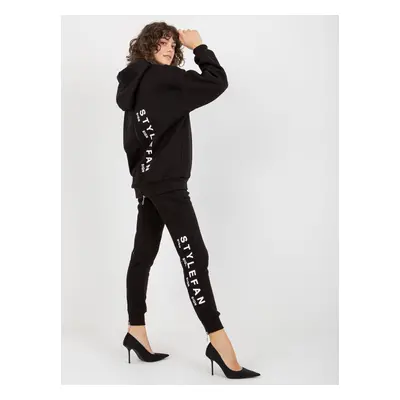 Black women's tracksuit with inscriptions and zippers