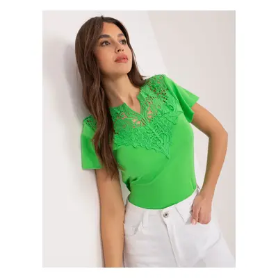 Light green blouse with lace and short sleeves