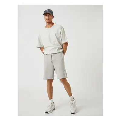 Koton Basic Shorts Tie the waist, Slogan and Printed Labels, Pockets.