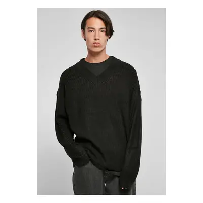 Black V-neck sweater