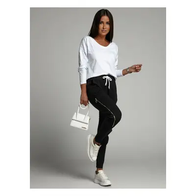 Set of women's cargo trousers and white and black blouse