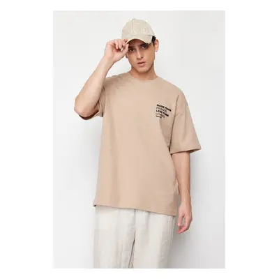 Trendyol Beige Oversize/Wide Cut Textured Waffle T-Shirt with Raised Text Printed Label