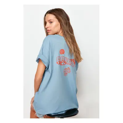 Trendyol Indigo 100% Cotton Slogan Printed on the Back Boyfriend Fit Crew Neck Knitted T-Shirt