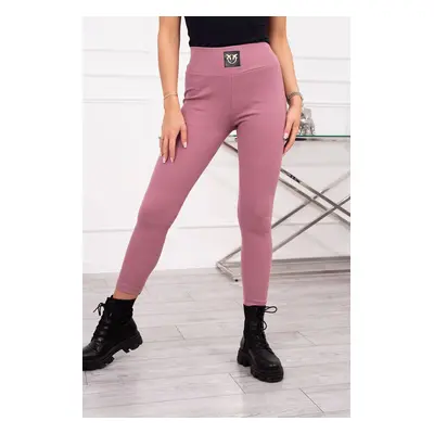 Ribbed high-waisted leggings of dark pink color