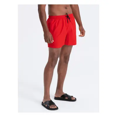 Ombre Neon men's swim shorts with magic print effect - red