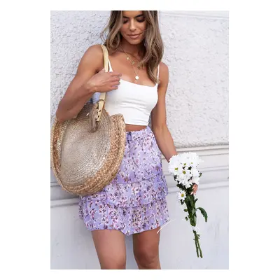 Short skirt with purple ruffles