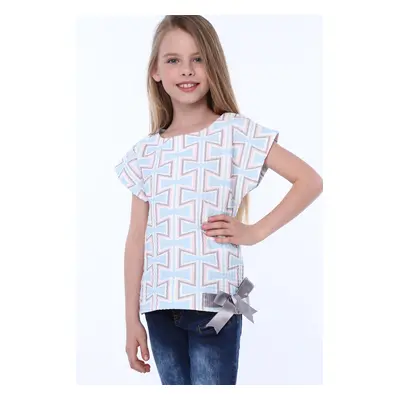 Girls' blouse with patterns and bow