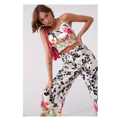 Satin ensemble with floral wide trousers and top in light beige and black