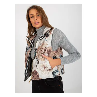 Lady's beige quilted vest with flowers