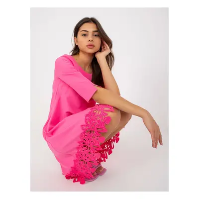 Loose pink cocktail dress with openwork hem