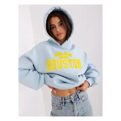 Light blue women's sweatshirt with a slogan