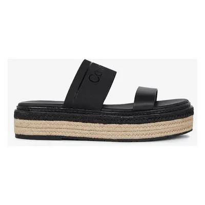 Black women's slippers by Calvin Klein