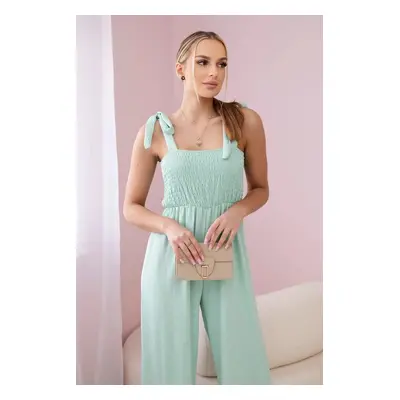 Waisted jumpsuit with a pleated top in dark mint colour