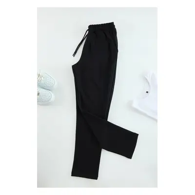 Trendyol Black Regular Cut Pique Textured Fabric Detailed Sweatpants