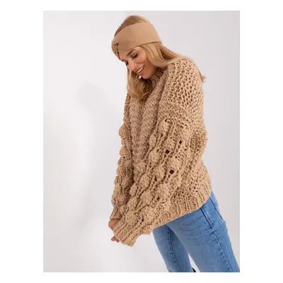 Beige oversize sweater with round neckline