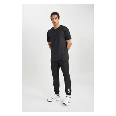 DEFACTO Fit Slim Fit Double Pocket Woven Sports Jogger Sweatpants