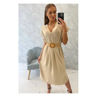 Dress with decorative belt in beige color