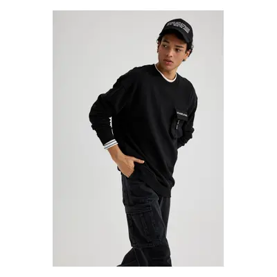 DEFACTO Boxy Fit Pocket Printed Crew Neck Printed Sweatshirt