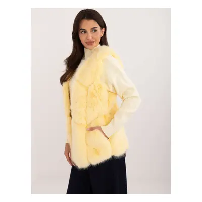 Light yellow vest with fur