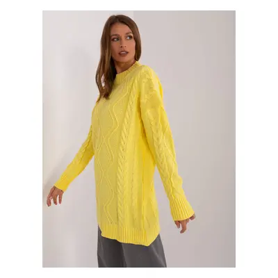 Yellow knitted sweater with cables