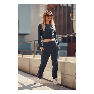 Ordinary women's tracksuit in dark blue