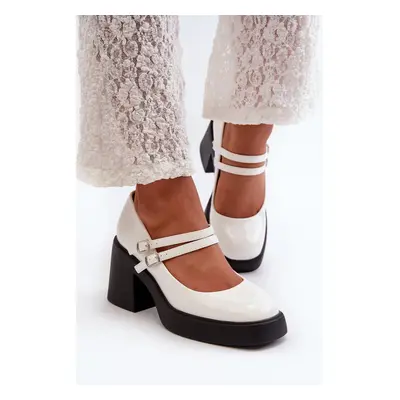 White patent leather pumps with chunky heels from Halmina