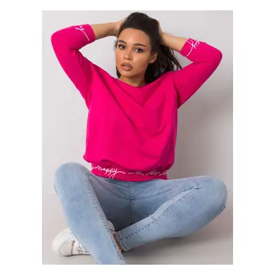 Fuchsia sweatshirt with lettering on the cuffs