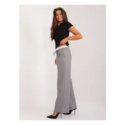 Grey fabric trousers with pockets