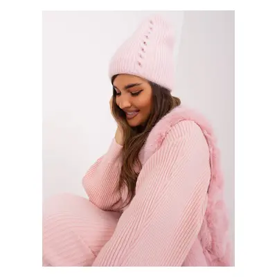 Women's winter hat in light pink color