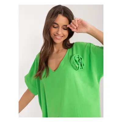 Light green oversize blouse with flower